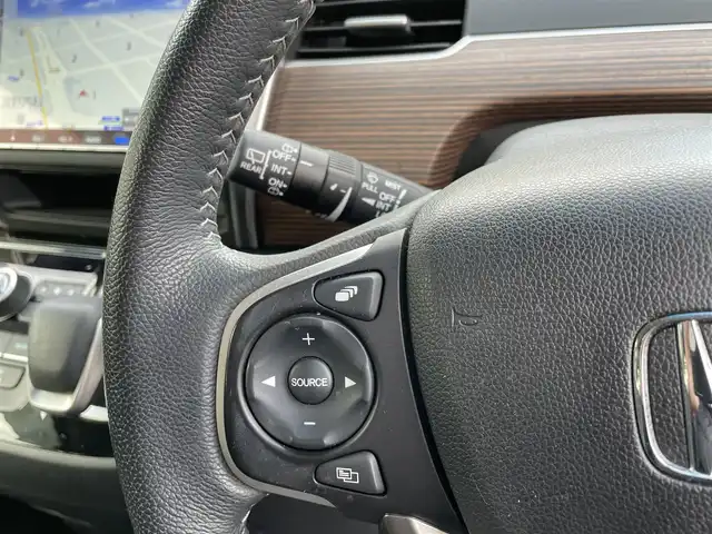 ホンダ フリード＋ ハイブリット クロスター 大分県 2023(令5)年 2.8万km シルバーミストグリーンM ワンオーナー/ハーフレザー調シート/純正メモリナビ VXM-237VFNi/【フルセグ/DVD/BTオーディオ】/バックカメラ/後席フリップダウンモニター/両側パワースライドドア/純正15インチアルミホイール/レーダークルーズコントロール/衝突被害軽減システム/レーンアシスト/ETC/LEDヘッドライト/LEDフォグランプ/オートライト/レザーステアリング/チルトステアリング/ステアリングリモコン/運転席シートリフター/前席シートヒーター/ミラーヒーター/ワイパーヒーター/ウインカーミラー/横滑り防止装置/エンジンプッシュスタート/リアプライバシーガラス/ドアバイザー/フロアマット/電動格納ミラー/カーテン＆サイド＆Wエアバッグ/ABS/スマートキー×2/保証書/車両取説/ナビ取説