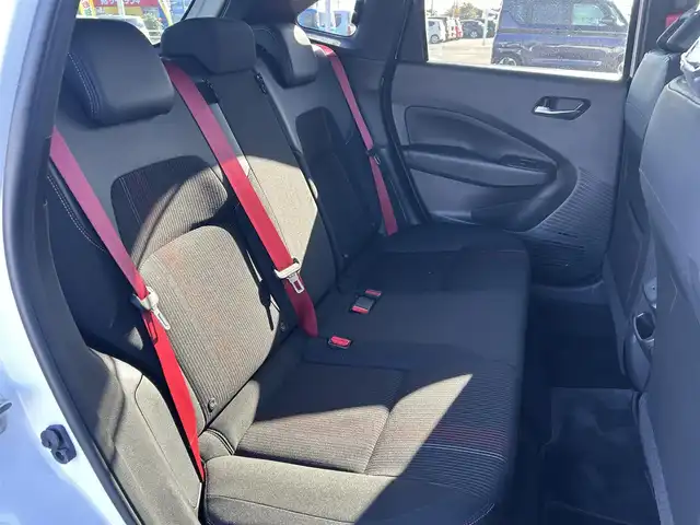 日産 オーラ ニスモ 栃木県 2022(令4)年 1.6万km ピュアホワイトパール 全方位運転支援システム/・インテリジェントエマージェンシーブレーキ/・踏み間違い衝突防止アシスト　・標識検知機能/・前方衝突予測警報　・ふらつき警報　・後退時車両検知機能/・車線逸脱警報　・車線逸脱防止支援システム/・後側方衝突防止支援システム/車両検知警報/9インチワイドディスプレイコネクトナビゲーションシステム/フルセグTV/Bluetooth/USB/AppleCarPlay/インテリジェントアラウンドビューモニター/インテリジェントルームミラー/ETC2.0/ドライブレコーダー/ワイヤレス充電/ブラックフードデカール/NISMOロゴ入りレッド加飾付ブラック合皮ハーフレザーシート/スマートキー/プッシュEgスタート/純正17インチAW/アダプティブLEDヘッドライト/フォグランプ