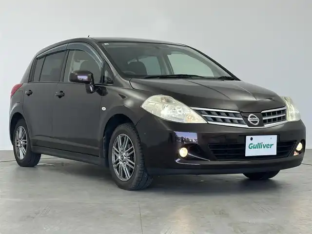 日産 ティーダ 15M SV +プラズマ 愛知県 2012(平24)年 7.8万km ビターショコラ 純正ナビ　/（フルセグ/BT/CD/DVD）　/15インチTiradoアルミホイール　/純正アルミ付きサマータイヤ有り/ドライブレコーダー　/ビルトインETC　/純正フロアマット　/LEDライト　/ハーフレザーシート　/オートライト　/ABS