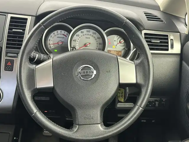 日産 ティーダ 15M SV +プラズマ 愛知県 2012(平24)年 7.8万km ビターショコラ 純正ナビ　/（フルセグ/BT/CD/DVD）　/15インチTiradoアルミホイール　/純正アルミ付きサマータイヤ有り/ドライブレコーダー　/ビルトインETC　/純正フロアマット　/LEDライト　/ハーフレザーシート　/オートライト　/ABS