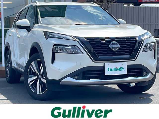 日産 エクストレイル G e－4ORCE 道央・札幌 2023(令5)年 1.8万km ブリリアントホワイトパール ・４WD/・衝突軽減ブレーキ/・プロパイロット/・サンルーフ/・パーキングアシスト/・全方位カメラ/・レザーシート/・パワーシート/・純正ディスプレイオーディオ/　BT＆USB＆TV/・バックカメラ/・サイドカメラ/・フロントカメラ/・パワーバックドア/・ブラインドスポットモニター/・デジタルインナーミラー/・置くだけ充電/・ヘッドアップディスプレイ/・ステアリングヒーター/・シートヒーター/・ダウンヒルアシスト/・プッシュスタート/・スマートキー/・コーナーセンサー/・レーンキープアシスト/・オートリトラミラー/・ETC/・オートライト/・オートエアコン/・社外AW＆夏タイヤ積込/・ウィンカーミラー/・フォグライト/・スペアキー