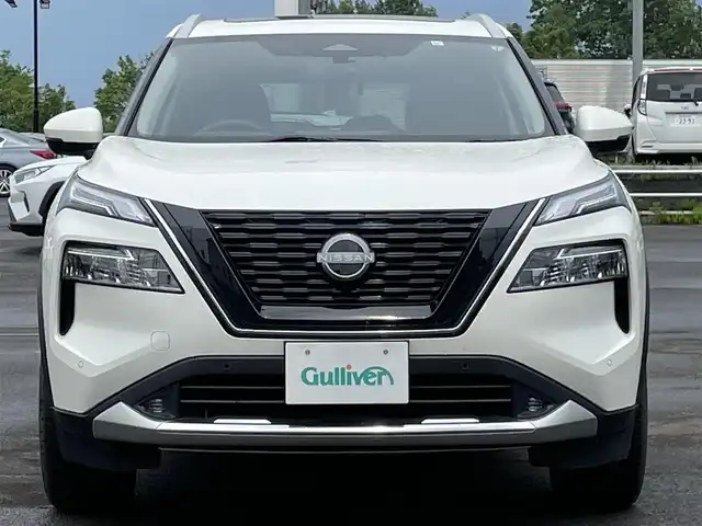 日産 エクストレイル G e－4ORCE 道央・札幌 2023(令5)年 1.8万km ブリリアントホワイトパール ４WD/BOSEプレミアムサウンドシステム/サンルーフ/純正メーカーナビ/AM/FM/BT/フルセグ/プロパイロット/エマージェンシーブレーキ/横滑り防止装置/レーダークルーズコントロール/レーンキープアシスト/パーキングアシスト/クリアランスソナー/アラウンドビューモニター/ビルトインETC2.0/ドライブレコーダー/デジタルインナーミラー/e-Pedal/EVMODE/DRIVEMODE切替/パワーバックドア/前席パワーシート/D席メモリーシート/全席シートヒーター/前席エアシート/レザーシート/革巻きステアリング/ステアリングリモコン/ハンドルヒーター/電動パーキング/オートブレーキホールド/AC100V/プッシュスタート/スマートキー/LEDヘッドライト/オートライト/オートハイビーム/フォグランプ/電動格納ミラー/ウィンカーミラー/純正フロアマット/スペアキー/社外AW付冬タイヤ積込/235/60/R18/2022年/山7mm