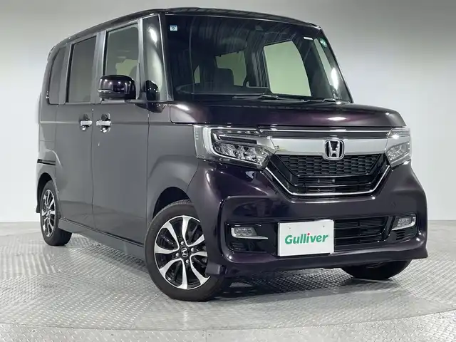 ホンダ Ｎ ＢＯＸ カスタム G EX ホンダセンシング 神奈川県 2017(平29)年 2.3万km プレミアムベルベットパープル・パール ホンダセンシング/・急アクセル抑制機能/・近距離衝突軽減ブレーキ/・誤発進抑制機能/後方誤発進抑制機能/・衝突軽減ブレーキ/・歩行者事故低減ステアリング/・路外逸脱抑制機能/・渋滞追従機能付きアダプティブクルーズコントロール/・車線維持支援システム/・標識認識機能/・先行車発進お知らせ機能/・オートハイビーム/・パーキングセンサーシステム/純正ナビ/・BT/フルセグTV/CD/DVD/SD/USB/バックカメラ/両側電動スライドドア/LEDヘッドライト/・フォグランプ/ステアリングスイッチ/・Autoライト/スマートキー/・スペアキー(1本)/・エンジンスターター/・プッシュスタートボタン/電動格納ミラー/・ウィンカーミラー/コーナーセンサー/純正フロアマット/純正アルミホイール