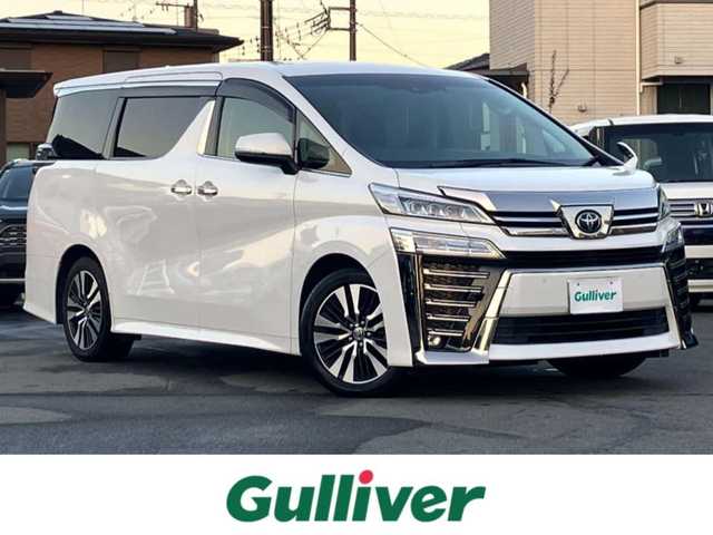 トヨタ ヴェルファイア Z Gエディション 静岡県 2020(令2)年 3.8万km ホワイトパールクリスタルシャイン エンジンスタートボタン/パワーステアリング/パワーウィンドウ/100Ｖ充電/スマートキー/スペアキー1本/Ｗオートエアコン/レーダークルーズコントロール/純正9インチナビ（ＣＤ／ＤＶＤ／ＢＴ／フルセグ）/USB入力端子/ETC2.0/N席電動オットマン/二列目電動オットマン/二列目電動リクライニング/前席パワーシート/電動リアゲート/ドライブレコーダー前後/純正フロアマット/合皮シート/両側パワースライドドア/純正アルミホイール/ABS/横滑り防止装置/コーナーセンサー前後/レーンキープアシスト/盗難防止装置/オートライト/オートマチックハイビーム/三眼LED/W+サイドエアバッグ/カーテンエアバッグ/衝突軽減システム/ステアリングヒーター