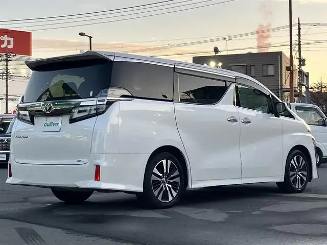 トヨタ ヴェルファイア Z Gエディション 静岡県 2020(令2)年 3.8万km ホワイトパールクリスタルシャイン エンジンスタートボタン/パワーステアリング/パワーウィンドウ/100Ｖ充電/スマートキー/スペアキー1本/Ｗオートエアコン/レーダークルーズコントロール/純正9インチナビ（ＣＤ／ＤＶＤ／ＢＴ／フルセグ）/USB入力端子/ETC2.0/N席電動オットマン/二列目電動オットマン/二列目電動リクライニング/前席パワーシート/電動リアゲート/ドライブレコーダー前後/純正フロアマット/合皮シート/両側パワースライドドア/純正アルミホイール/ABS/横滑り防止装置/コーナーセンサー前後/レーンキープアシスト/盗難防止装置/オートライト/オートマチックハイビーム/三眼LED/W+サイドエアバッグ/カーテンエアバッグ/衝突軽減システム/ステアリングヒーター
