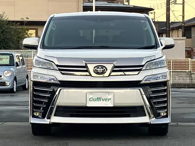 トヨタ ヴェルファイア Z Gエディション 静岡県 2020(令2)年 3.8万km ホワイトパールクリスタルシャイン エンジンスタートボタン/パワーステアリング/パワーウィンドウ/100Ｖ充電/スマートキー/スペアキー1本/Ｗオートエアコン/レーダークルーズコントロール/純正9インチナビ（ＣＤ／ＤＶＤ／ＢＴ／フルセグ）/USB入力端子/ETC2.0/N席電動オットマン/二列目電動オットマン/二列目電動リクライニング/前席パワーシート/電動リアゲート/ドライブレコーダー前後/純正フロアマット/合皮シート/両側パワースライドドア/純正アルミホイール/ABS/横滑り防止装置/コーナーセンサー前後/レーンキープアシスト/盗難防止装置/オートライト/オートマチックハイビーム/三眼LED/W+サイドエアバッグ/カーテンエアバッグ/衝突軽減システム/ステアリングヒーター