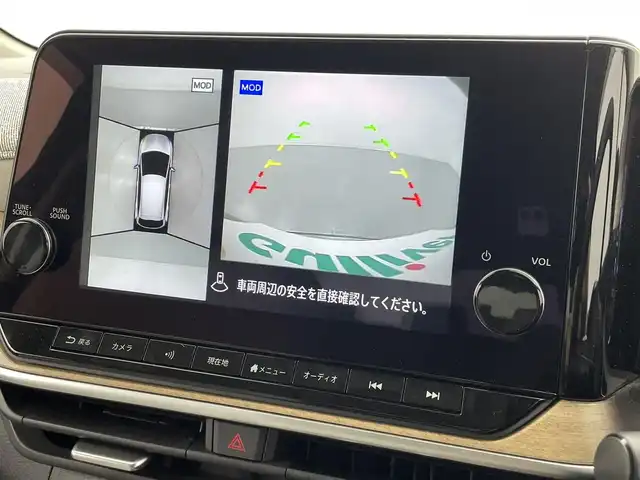 日産 オーラ G レザーエディション 熊本県 2022(令4)年 0.6万km ガーネットレッド/スーパーブラック 2トーン ワンオーナー/禁煙車/純正ナビ（ApplCarPlay・BT・フルセグ・USB・HDMI）/全周囲カメラ/純正前方ドライブレコーダー/ビルトインETC2.0/レーダークルーズコントロール/プロパイロット/インテリジェントエマージェンシーブレーキ/踏み間違い衝突防止アシスト/標識認識機能/前方衝突予測警報/ふらつき警報機能/車線逸脱防止支援システム/車線逸脱警報/後側方車両検知警報/後退時車両検知警報/車両接近通報装置/ブラインドスポットモニター/置くだけ充電/BOSEサウンド/前後クリアランスソナー/オートライト/オートマチックハイビーム/LEDヘッドライト/フォグライト/スマートキー/プッシュスタート/スペアキー1本/保証書/取扱説明書