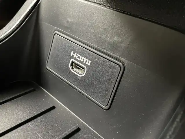 日産 オーラ G レザーエディション 熊本県 2022(令4)年 0.6万km ガーネットレッド/スーパーブラック 2トーン ワンオーナー/禁煙車/純正ナビ（ApplCarPlay・BT・フルセグ・USB・HDMI）/全周囲カメラ/純正前方ドライブレコーダー/ビルトインETC2.0/レーダークルーズコントロール/プロパイロット/インテリジェントエマージェンシーブレーキ/踏み間違い衝突防止アシスト/標識認識機能/前方衝突予測警報/ふらつき警報機能/車線逸脱防止支援システム/車線逸脱警報/後側方車両検知警報/後退時車両検知警報/車両接近通報装置/ブラインドスポットモニター/置くだけ充電/BOSEサウンド/前後クリアランスソナー/オートライト/オートマチックハイビーム/LEDヘッドライト/フォグライト/スマートキー/プッシュスタート/スペアキー1本/保証書/取扱説明書