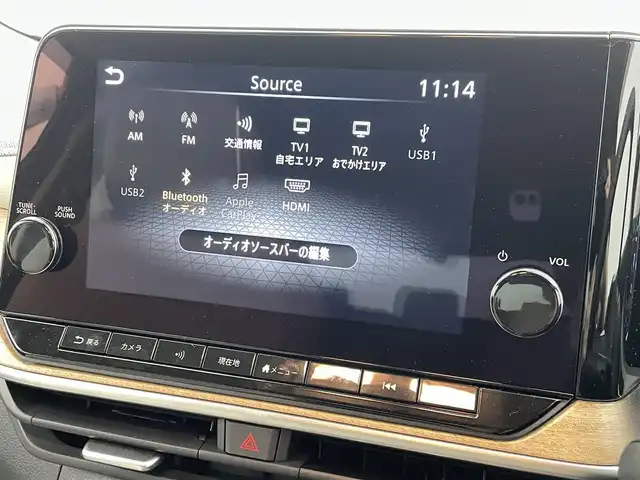 日産 オーラ G レザーエディション 熊本県 2022(令4)年 0.6万km ガーネットレッド/スーパーブラック 2トーン ワンオーナー/禁煙車/純正ナビ（ApplCarPlay・BT・フルセグ・USB・HDMI）/全周囲カメラ/純正前方ドライブレコーダー/ビルトインETC2.0/レーダークルーズコントロール/プロパイロット/インテリジェントエマージェンシーブレーキ/踏み間違い衝突防止アシスト/標識認識機能/前方衝突予測警報/ふらつき警報機能/車線逸脱防止支援システム/車線逸脱警報/後側方車両検知警報/後退時車両検知警報/車両接近通報装置/ブラインドスポットモニター/置くだけ充電/BOSEサウンド/前後クリアランスソナー/オートライト/オートマチックハイビーム/LEDヘッドライト/フォグライト/スマートキー/プッシュスタート/スペアキー1本/保証書/取扱説明書