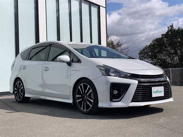 トヨタ プリウス α S ツーリングセレクション G’s 大阪府 2015(平27)年 5.7万km ホワイトパールクリスタルシャイン ワンオーナー/純正メモリーナビ/CD/DVD/Bluetooth/フルセグTV/バックカメラ/LEDオートヘッドライト/LEDイルミネーションビーム/純正大径マフラー/純正18インチAW/G’s専用サスペンション/革巻きステアリング/ハーフレザスポーツーシート/USB/プッシュスタート/スマートキー/ビルトインETC