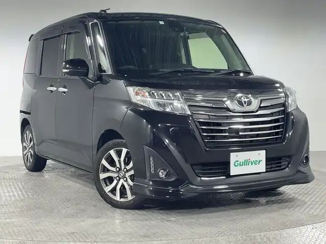 トヨタ ルーミー カスタムG－T 神奈川県 2018(平30)年 4.6万km ブラックマイカメタリック 社外7型ワイドSDナビゲーション【AVIC-CL901】/AM FM BT MSV フルセグ USB/バックカメラ/両側パワースライドドア/リアロールシェード/社外前方ドライブレコーダー/ETC2.0/クルーズコントロール/純正フロントリップ/リアスポイラー/車線逸脱防止機能/TRC/PCS/アイドリングストップ/LEDヘッドライト/フォグランプ/電装格納ミラー/スマートキー