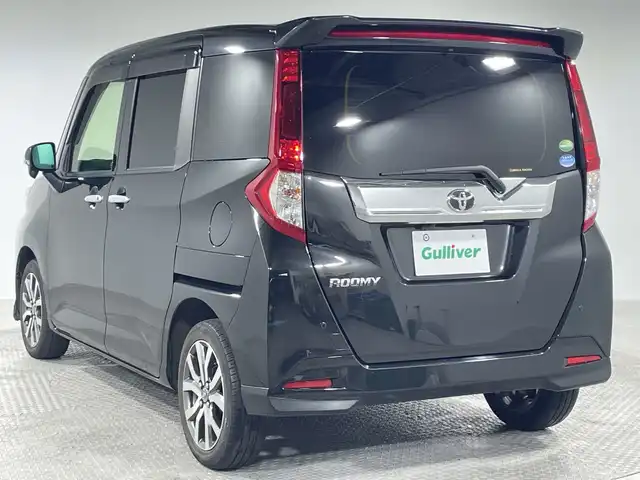 トヨタ ルーミー カスタムG－T 神奈川県 2018(平30)年 4.6万km ブラックマイカメタリック 社外7型ワイドSDナビゲーション【AVIC-CL901】/AM FM BT MSV フルセグ USB/バックカメラ/両側パワースライドドア/リアロールシェード/社外前方ドライブレコーダー/ETC2.0/クルーズコントロール/純正フロントリップ/リアスポイラー/車線逸脱防止機能/TRC/PCS/アイドリングストップ/LEDヘッドライト/フォグランプ/電装格納ミラー/スマートキー