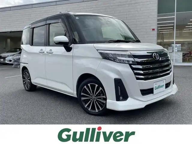 トヨタ ルーミー カスタムG－T 鳥取県 2021(令3)年 2.5万km ブラックマイカメタリック/パールホワイト2トーン ツートンルーフ/スマートアシスト/純正9型ナビ【NSZT-Y68T】/・フルセグ/・CD/DVD/・Bluetooth/パノラミックビューモニター/両側電動スライドドア/ETC/スマートキー/プッシュスタート/前席シートヒーター/純正エアロ/純正AW/ターボ/ABS/クリアランスソナー/オートライト/LEDヘッドライト/Wエアバック