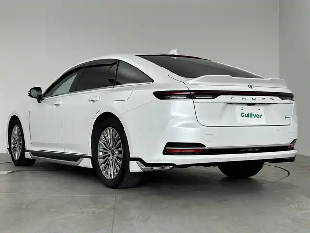 トヨタ クラウン Z 愛知県 2024(令6)年 3.4万km プレシャスホワイトパール モデリスタフルエアロ/（フロント、サイド、リアアンダー）/メーカー12.3型メモリナビ/（FM/AM/フルセグTV/BT）/バックカメラ/（バック、サイド）/レザーシート/全席シートベンチレーション/全席シートヒーター/前席パワーシート/デジタルインナーミラー/純正前後ドラレコ/ETC2.0/電動リアウィンドウサンシェード/電動トランク/トヨタセーフティセンス/・プリクラッシュセーフティ/・レーントレーシングアシスト/・レーンディパーチャーアラート/・レーダークルーズコントロール（全車速追従機能付）/・アダプティブハイビームシステム/・ロードサインアシスト/・ドライバー異常時対応システム/・プロアクティブドライビングアシスト/・発進遅れ告知機能/・緊急時操舵支援/・フロントクロストラフィックアラート/・レーンチェンジアシスト/・ヘッドアップディスプレイ/・クリアランスソナー/・ブラインドスポッとモニター/純正19インチAW/純正フロアマット/ドアバイザー