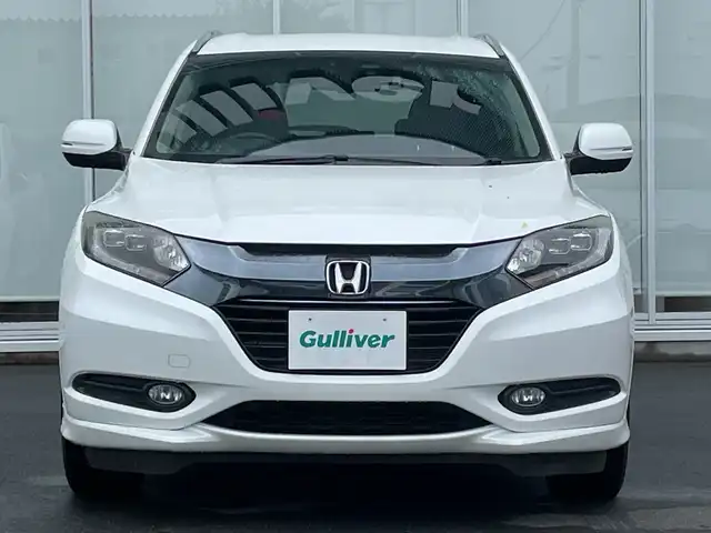 ホンダ ヴェゼル ハイブリッド Z 神奈川県 2014(平26)年 8.3万km ホワイトオーキッドパール 社外ナビ/フルセグ/CD/DVD/クルーズコントロール　/バックカメラ　/シートヒーター　/ETC　/ドライブレコーダー　/電動パーキング　/LEDヘッドライト　/オートライト　/プッシュスタート/スマートキー/純正フロアマット　/純正アルミホイール　/ABS　/横滑り防止装置/Ｗ＋サイドエアバック/カーテンエアバック