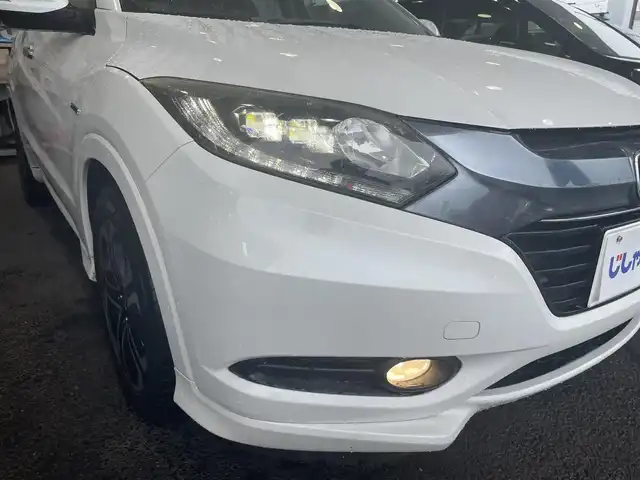 ホンダ ヴェゼル ハイブリッド Z 千葉県 2014(平26)年 8.3万km ホワイトオーキッドパール (株)IDOMが運営する【じしゃロン八千代店】の自社ローン対象車両になります。こちらは現金またはオートローンご利用時の価格です。自社ローンご希望の方は別途その旨お申付け下さい/社外ナビ/フルセグ/CD/DVD/クルーズコントロール　/バックカメラ　/シートヒーター　/ETC　/ドライブレコーダー　/電動パーキング　/LEDヘッドライト　/オートライト　/プッシュスタート/スマートキー/純正フロアマット　/純正アルミホイール　/ABS　/横滑り防止装置/Ｗ＋サイドエアバック/カーテンエアバック