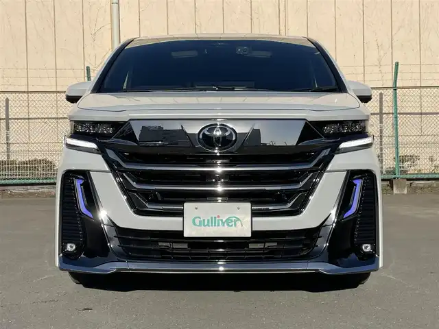 トヨタ ヴェルファイア ハイブリット Z プレミア 東京都 2023(令5)年 2.1万km プラチナホワイトパールマイカ 純正ナビ　/Ｂｌｕｅｔｏｏｔｈ　/フルセグＴＶ　/全周囲カメラ　/フリップダウンモニター　/ユニバーサルステップ　/左右独立ムーンルーフ　/ＥＴＣ２．０　/前後ドライブレコーダー　/純正フロアマット　/純正アルミホイール/ABS/横滑り防止装置/コーナーセンサー/レーンアシスト/盗難防止装置/オートライト/オートマチックハイビーム/衝突被害軽減システム/BSM