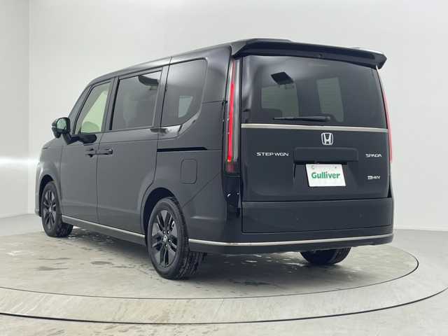 ホンダ ステップワゴン スパーダ eHEV 熊本県 2025(令7)年 0.1千km クリスタルブラックパール 登録済未使用車/純正ナビLXM-247VFLi（ＣＤ・ＤＶＤ・フルセグ・ＢＴ・ＳＤ・ＵＳＢ）/バックカメラ　/両側パワースライドドア　/前席シートヒーター　/ホンダセンシング/・衝突軽減ブレーキ/・レーンキープアシスト/・レーダークルーズコントロール/・踏み間違い防止/・標識認識機能/・後方誤発進抑制機能/・近距離衝突軽減ブレーキ/・車線維持支援システム/・歩行者事故低減ステアリング/・先行車発進お知らせ/・ブラインドスポットモニター/・路外逸脱抑制機能/横滑り防止　/前後クリアランスソナー/パワーバックドア/パドルシフト/オートブレーキホールド/ハーフレザーシート/純正１６インチAW/オートライト/LEDヘッドライト/フォグライト/スマートキー/プッシュスタート/スペアキー1本/保証書/取扱説明書　