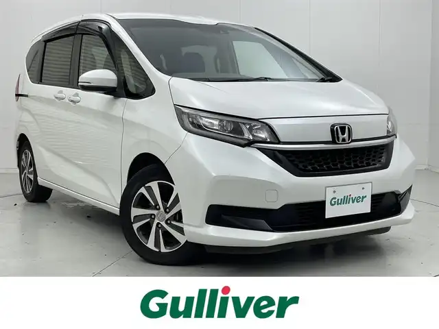 ホンダ フリード G ホンダセンシング 茨城県 2020(令2)年 3.9万km プラチナホワイトパール 純正7インチナビ/Bluetooth/フルセグ/CD/DVD/AM/FM/前後ドラレコ/ETC2.0/レーダークルーズコントロール/シートヒーター/LEDヘッドライト/オートライト/両側パワースライドドア/レーンキープアシスト/コーナーセンサー/スマートキー/スペアキー
