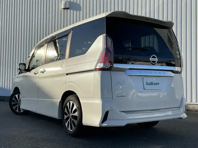 日産 セレナ ハイウェイスターVセレクションⅡ 福岡県 2018(平30)年 7万km ブリリアントホワイトパール プロパイロット/フリップダウンモニター/純正９インチナビ（ＭＭ５１８Ｄ－Ｌ）/フルセグTV/CD/DVD/BD/SD/BT/AUX/AM/FM/アラウンドビューモニター/エマージェンシーブレーキ/ＬＤＷ/ソナー/レーダークルーズコントロール/デジタルインナーミラー/ハンズフリー両側パワースライドドア/ステアリングヒーター/前席シートヒーター/パーキングアシスト/ビルトインETC/ドライブレコーダー/電動パーキング/ブレーキホールド/ステアリングリモコン/アイドリングストップ/スマートキー/プッシュスタート/純正AW/ロールサンシェード/シートバックテーブル
