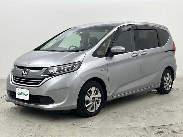 ホンダ フリード ハイブリット G ホンダセンシング 宮城県 2018(平30)年 6万km ルナシルバーM 禁煙車/ホンダセンシング/・衝突軽減ブレーキ/・路外逸脱抑制機能/・先行車発進お知らせ機能/・アダプティブクルーズコントロール/・車線維持支援システム/・標識認識機能/両側パワースライドドア/バックカメラ/純正9インチSDナビ/・BT/SD/DVD/CD/AM/FM/フルセグTV/純正ドライブレコーダー（F/R）/ビルトインETC/ステアリングスイッチ/プッシュスタート/スマートキー/LEDヘッドライト/純正フロアマット/純正15インチホイールキャップ/後席ロールサンシェード/ドアバイザー/横滑り防止装置/アイドリングストップ