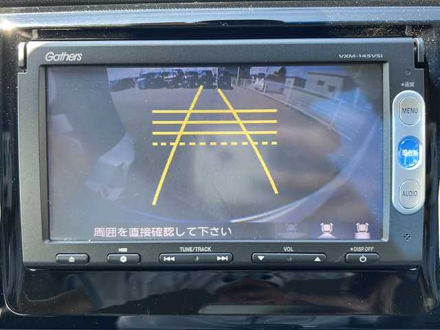 ホンダ Ｎ ＷＧＮ カスタム G Aパッケージ 富山県 2014(平26)年 5.6万km プレミアムホワイトパール ・4WD/・寒冷地仕様/・純正ギャザーズナビ/　BT/CD/ ワンセグ/・社外ETC/・バックカメラ/・衝突軽減ブレーキ/・横滑り防止/・クルーズコントロール/・LEDヘッドライト/・オートライト/・純正フロアマット/・純正14インチAW/・プッシュスタート/・スマートキー/・ドアバイザー