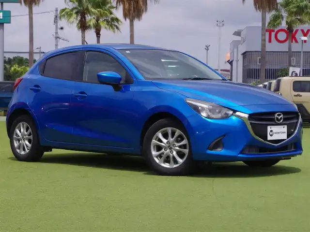 マツダ デミオ 13S 千葉県 2014(平26)年 5.1万km ダイナミックブルーマイカ スマートシティブレーキサポート/エコアイドル/純正SDナビ/地デジTV/【DVD/CD再生機能　Bluetooth接続】/バックカメラ/革巻きステアリング/ステアリングスイッチ/LEDヘッドライト/ウインカーミラー/純正15インチアルミホイル/サイド/カーテンエアバッグ/アドバンストキーレスエントリー