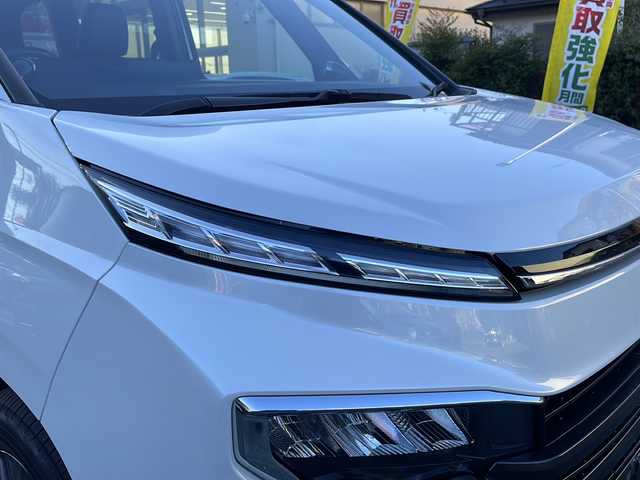 トヨタ ヴォクシー ハイブリッド S－Z 埼玉県 2023(令5)年 1.5万km ホワイトパールクリスタルシャイン Toyota Safety Sense/純正メモリナビ/　　Bluetooth/CD/DVD/ブルーレイ/フルセグ/HDMI/純正フリップダウンモニター/パノラミックビューモニター/両側パワースライドドア/パワーバックドア/レーダークルーズコントロール/LEDオートヘッドライト、オートマチックハイビーム/ハーフレザーシート/全席シートヒーター/純正16インチアルミホイール/パーキングアシスト/USBポート/100V充電/横滑り防止装置/ETC2.0/禁煙車/保証書/取扱説明書/スペアキー