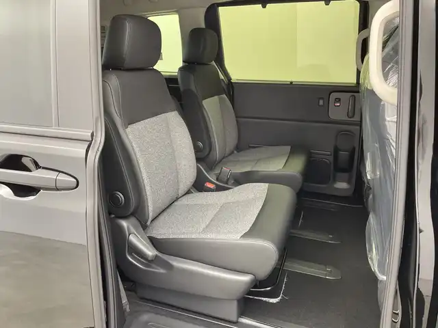 ホンダ フリード ハイブリット e:HEV AIR EX 新潟県 2025(令7)年 0.1千km クリスタルブラックパール 4WD/純正メモリナビ/　フルセグTV/Bluetooth/AppleCarPlay/Androiduto/レーダークルーズコントロール/衝突被害軽減ブレーキ/レーンキープアシスト/ブラインドスポットインフォメーション/踏み間違い衝突軽減システム/前後コーナーセンサー/両側パワースライドドア/前席シートヒーター/バックモニター/オートマチックハイビーム/LEDヘッドライト/オートライト/横滑り防止装置/レザーステアリング/ステアリングスイッチ/禁煙車