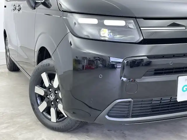 ホンダ フリード ハイブリット e:HEV AIR EX 新潟県 2025(令7)年 0.1千km クリスタルブラックパール 4WD/純正メモリナビ/　フルセグTV/Bluetooth/AppleCarPlay/Androiduto/レーダークルーズコントロール/衝突被害軽減ブレーキ/レーンキープアシスト/ブラインドスポットインフォメーション/踏み間違い衝突軽減システム/前後コーナーセンサー/両側パワースライドドア/前席シートヒーター/バックモニター/オートマチックハイビーム/LEDヘッドライト/オートライト/横滑り防止装置/レザーステアリング/ステアリングスイッチ/禁煙車
