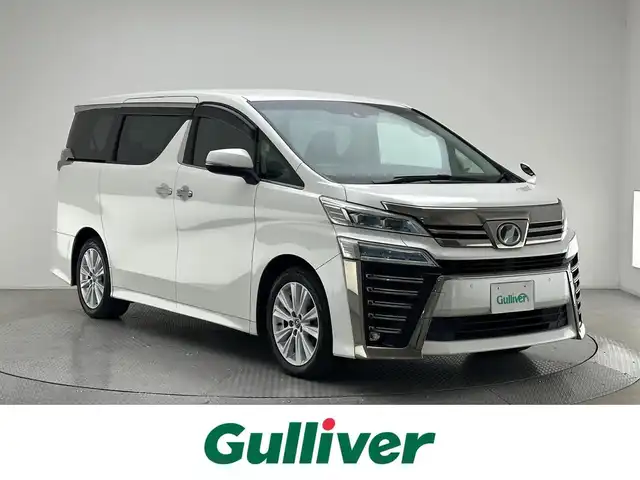 トヨタ ヴェルファイア Z Aエディション 兵庫県 2018(平30)年 4.2万km ホワイトパールクリスタルシャイン デジタルインナーミラー　/アダプティブクルーズコントロール　/ビルトインＥＴＣ　/両側パワースライドドア　/後席フリップダウンモニター　/トヨタセーフティセンス　/リヤクロストラフィックアラート/レーントレーシングアシスト/純正SDナビ(NSZT-Y66T)/Bluetoothオーディオ/フルセグテレビ/バックカメラ/純正アルミホイール(18インチ)/前後コーナーセンサー/LEDヘッドライト/プッシュスタート/スマートキー