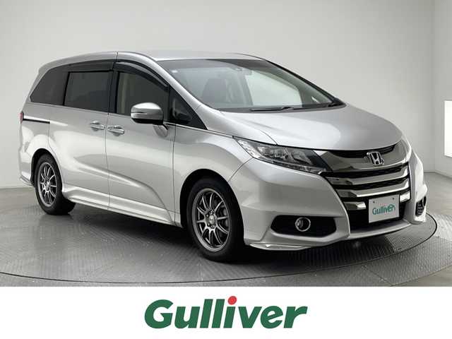 ホンダ オデッセイ アブソルート・Xホンダセンジング 兵庫県 2016(平28)年 5.4万km スーパープラチナメタリック 純正メモリナビ/（フルセグ、CD、DVD、BT、MSV）/両側パワースライドドア/ドライブレコーダー/バックカメラ/ハーフレザー/パワーシート/レーダークルーズコントロール/ビルトインETC/衝突軽減/LDA/標識認識/LEDヘッドライト/フォグランプ/オートライト/純正フロアマット/ドアバイザー
