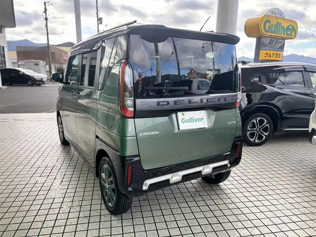 三菱 デリカミニ T プレミアム 京都府 2024(令6)年 1.2万km ＤグリーンⅡ ターボ4WD/マイプロパイロット/・レーダークルーズコントロール/・車線維持支援機能/デジタルルームミラー/純正9インチメモリーナビ、地デジ、Bluetooth/マルチアラウンドモニター/オートライト/前席シートヒーター/ハンドルヒーター/前後ドライブレコーダー/ビルトインETC/両側パワースライドドア /LEDヘッドランプ