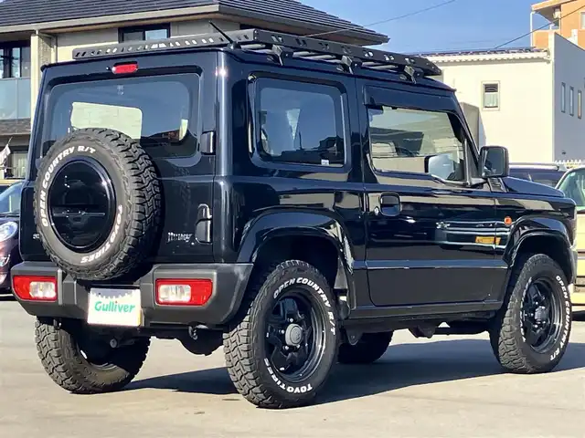 スズキ ジムニー XG 静岡県 2020(令2)年 1.7万km ブルーイッシュブラックパール3 ワンオーナー/ＳＤナビ（CD/DVD/BT/フルセグ）/バックカメラ/ドアバイザー/社外ルーフラック/社外グリル　LEDポジションライト/ホワイトレタータイヤ（TOYOタイヤ）/ETC/ドライブレコーダー前後/パワーウィンドウ/パワーステアリング/４WD/リモコンキー/マニュアルエアコン/USB入力端子/布シート/社外フロアマット/社外アルミホイール/背面タイヤ/ABS/横滑り防止装置/センターデフロック/レーンキープアシスト/盗難防止装置/オートライト/オートマチックハイビーム/ダウンヒルアシストコントロール/ハロゲン/Wエアバッグ/衝突軽減システム/ボンネットダンパー付き/バッグドア社外ダンパー