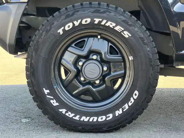 スズキ ジムニー XG 静岡県 2020(令2)年 1.7万km ブルーイッシュブラックパール3 ワンオーナー/ＳＤナビ（CD/DVD/BT/フルセグ）/バックカメラ/ドアバイザー/社外ルーフラック/社外グリル　LEDポジションライト/ホワイトレタータイヤ（TOYOタイヤ）/ETC/ドライブレコーダー前後/パワーウィンドウ/パワーステアリング/４WD/リモコンキー/マニュアルエアコン/USB入力端子/布シート/社外フロアマット/社外アルミホイール/背面タイヤ/ABS/横滑り防止装置/センターデフロック/レーンキープアシスト/盗難防止装置/オートライト/オートマチックハイビーム/ダウンヒルアシストコントロール/ハロゲン/Wエアバッグ/衝突軽減システム/ボンネットダンパー付き/バッグドア社外ダンパー