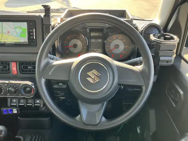 スズキ ジムニー XG 静岡県 2020(令2)年 1.7万km ブルーイッシュブラックパール3 ワンオーナー/ＳＤナビ（CD/DVD/BT/フルセグ）/バックカメラ/ドアバイザー/社外ルーフラック/社外グリル　LEDポジションライト/ホワイトレタータイヤ（TOYOタイヤ）/ETC/ドライブレコーダー前後/パワーウィンドウ/パワーステアリング/４WD/リモコンキー/マニュアルエアコン/USB入力端子/布シート/社外フロアマット/社外アルミホイール/背面タイヤ/ABS/横滑り防止装置/センターデフロック/レーンキープアシスト/盗難防止装置/オートライト/オートマチックハイビーム/ダウンヒルアシストコントロール/ハロゲン/Wエアバッグ/衝突軽減システム/ボンネットダンパー付き/バッグドア社外ダンパー