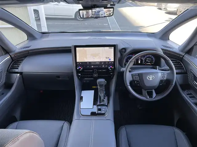 トヨタ アルファードハイブリット Z 東京都 2025(令7)年 0.1千km ブラック 登録済未使用車　/１４型ディスプレィオーディオ　/・ＡｐｐｌｅＣａｒＰlay・AndroidAuto/・BluetoothAudio/ＨＤＭＩ/ＵＳＢ/独立ムーンルーフ　/両側パワースライドドア　/パワーバックドア　　　/置くだけ充電　/快適温熱シート　/デジタルインナーミラー　/セーフティセンス/（予防安全パッケージ）/・プリクラッシュセーフティ/・レーントレーンシングアシスト/・全車速追従機能付レーダークルーズコントロール/・アダプティブハイビーム/・プロアクティブドライビングアシスト/純正フロアマット/保証書＆取説/ビルトインETC