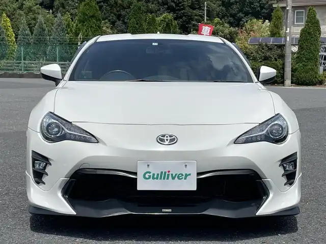 トヨタ ８６ GT 千葉県 2017(平29)年 1.8万km クリスタルホワイトパール ＴＲＤエアロ/ＴＲＤマフラー/ＲＡＹＳ５７ＸＲ１９インチＡＷ/ＴＥＩＮ車高調/Ｉｎｄｉｃａｔｏｒメーター/３連メーター（水温／油温／バキューム）/社外メモリナビ／フルセグＴＶ（ＡＶＩＣ－ＣＷ９０１）