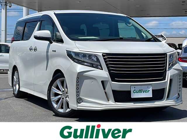 トヨタ アルファードハイブリット SR Cパッケージ 道北・旭川 2017(平29)年 6.6万km ホワイトパールクリスタルシャイン ・寒冷地仕様/・両側パワースライドドア/・パワーバックドア/・社外ナビ（アルパインビックX）/CD、DVD、BT、TV、ラジオ/・バックモニター/・社外フリップダウンモニター（アルパイン）/・ビルトインETC/・社外ドライブレコーダー（ケンウッド）/・純正フロアマット/・ステアリングヒーター/・フロントデアイサー/・レザーシート/・パワーシート/・メモリーシート/・シートヒーター/・電動格納ミラー/・オートライト/・LEDヘッドライト/・フォグランプ/・バックフォグ/・ウィンカーミラー/・オートハイビーム/・クルーズコントロール/・コーナーセンサー前後/・スマートキー一体型エンジンスターター/・社外エアロ前後（GLANZEN）/・18インチスタッドレス積み込み