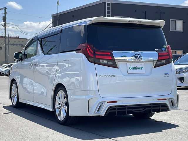 トヨタ アルファードハイブリット SR Cパッケージ 道北・旭川 2017(平29)年 6.6万km ホワイトパールクリスタルシャイン ・寒冷地仕様/・両側パワースライドドア/・パワーバックドア/・社外ナビ（アルパインビックX）/CD、DVD、BT、TV、ラジオ/・バックモニター/・社外フリップダウンモニター（アルパイン）/・ビルトインETC/・社外ドライブレコーダー（ケンウッド）/・純正フロアマット/・ステアリングヒーター/・フロントデアイサー/・レザーシート/・パワーシート/・メモリーシート/・シートヒーター/・電動格納ミラー/・オートライト/・LEDヘッドライト/・フォグランプ/・バックフォグ/・ウィンカーミラー/・オートハイビーム/・クルーズコントロール/・コーナーセンサー前後/・スマートキー一体型エンジンスターター/・社外エアロ前後（GLANZEN）/・18インチスタッドレス積み込み