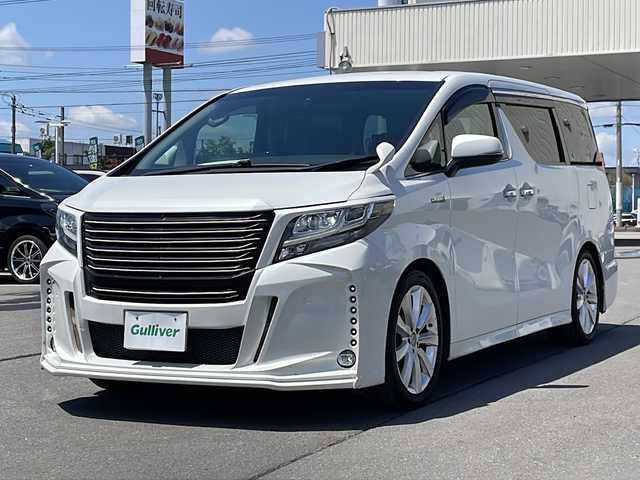 トヨタ アルファードハイブリット SR Cパッケージ 道北・旭川 2017(平29)年 6.6万km ホワイトパールクリスタルシャイン ・寒冷地仕様/・両側パワースライドドア/・パワーバックドア/・社外ナビ（アルパインビックX）/CD、DVD、BT、TV、ラジオ/・バックモニター/・社外フリップダウンモニター（アルパイン）/・ビルトインETC/・社外ドライブレコーダー（ケンウッド）/・純正フロアマット/・ステアリングヒーター/・フロントデアイサー/・レザーシート/・パワーシート/・メモリーシート/・シートヒーター/・電動格納ミラー/・オートライト/・LEDヘッドライト/・フォグランプ/・バックフォグ/・ウィンカーミラー/・オートハイビーム/・クルーズコントロール/・コーナーセンサー前後/・スマートキー一体型エンジンスターター/・社外エアロ前後（GLANZEN）/・18インチスタッドレス積み込み