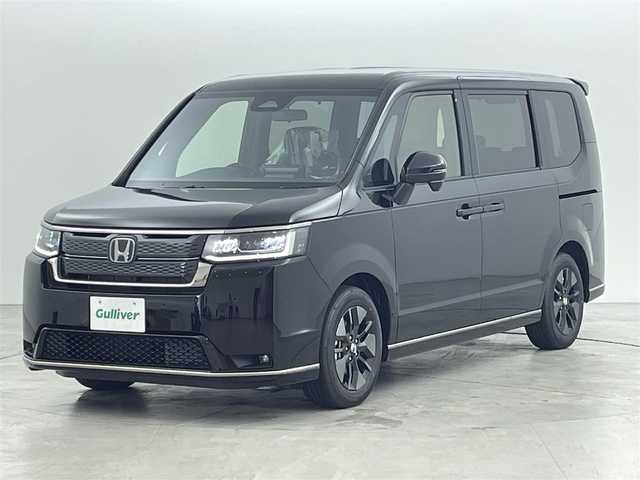ホンダ ステップワゴン スパーダ eHEV 福岡県 2025(令7)年 0.1万km未満 クリスタルブラックパール 登録済未使用車　/純正９型ナビ　/フルセグTV/バックカメラ　/アダプティブククルコン　/コーナーセンサー　/衝突被害軽減ブレーキ　/レーンキープ　/ＢＳＭ　/パドルシフト/両側電動スライドドア　/ハーフレザーシート　/シートヒーター　/パワーバックドア