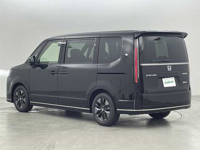 ホンダ ステップワゴン スパーダ eHEV 福岡県 2025(令7)年 0.1万km未満 クリスタルブラックパール 登録済未使用車　/純正９型ナビ　/フルセグTV/バックカメラ　/アダプティブククルコン　/コーナーセンサー　/衝突被害軽減ブレーキ　/レーンキープ　/ＢＳＭ　/パドルシフト/両側電動スライドドア　/ハーフレザーシート　/シートヒーター　/パワーバックドア