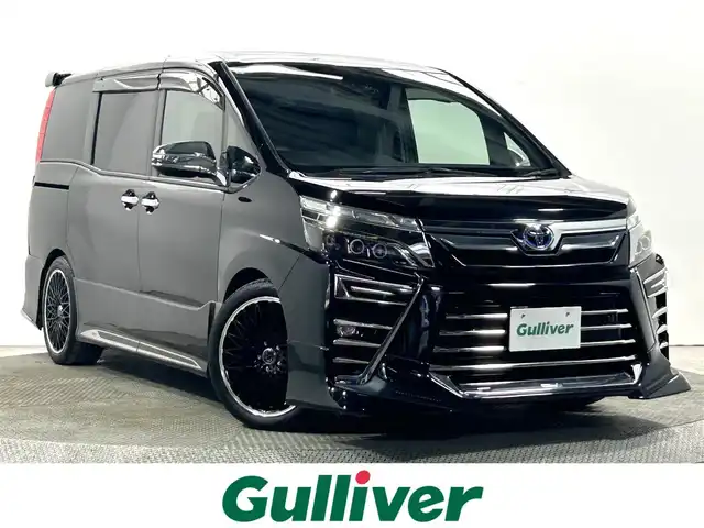 トヨタ ヴォクシー ハイブリッド ZS 煌Ⅲ 大阪府 2021(令3)年 3.5万km ブラック TRDエアロ LOXARNY18incAW 純正ナビTV フリップダウンモニター ハーフレザー シートヒーター クルーズコントロール 衝突軽減ブレーキ レーンアシスト オートハイビーム 両側パワースライドドア クリアランスソナー