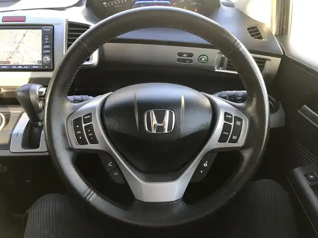 ホンダ フリード ハイブリット ジャストセレクション 栃木県 2012(平24)年 5.5万km プレミアムブラキッシュパール 株)IDOMが運営する【じしゃロン小山店】の自社ローン専用車両になります。こちらは現金またはオートローンご利用時の価格です。自社ローンご希望の方は別途その旨お申付け下さい//ワンオーナー/禁煙車/純正ワンセグナビ/（CD/DVD/AM/FMラジオ）/スマートキー/プッシュスタート/バックカメラ/ＥＴＣ/両側パワースライドドア/ドライブレコーダー/クルーズコントロール/ステアリングリモコン/電動格納ドアミラー/パワーウインドウ/オートライト/防眩ミラー