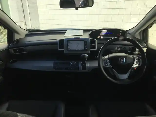 ホンダ フリード ハイブリット ジャストセレクション 栃木県 2012(平24)年 5.5万km プレミアムブラキッシュパール 株)IDOMが運営する【じしゃロン小山店】の自社ローン専用車両になります。こちらは現金またはオートローンご利用時の価格です。自社ローンご希望の方は別途その旨お申付け下さい//ワンオーナー/禁煙車/純正ワンセグナビ/（CD/DVD/AM/FMラジオ）/スマートキー/プッシュスタート/バックカメラ/ＥＴＣ/両側パワースライドドア/ドライブレコーダー/クルーズコントロール/ステアリングリモコン/電動格納ドアミラー/パワーウインドウ/オートライト/防眩ミラー