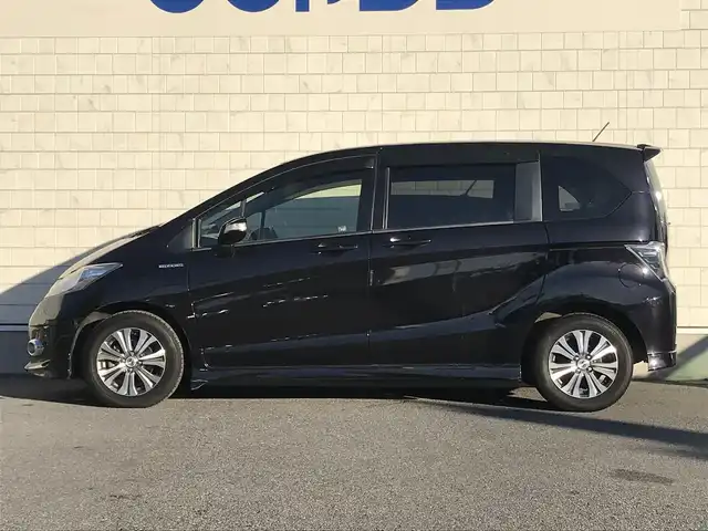 ホンダ フリード ハイブリット ジャストセレクション 栃木県 2012(平24)年 5.5万km プレミアムブラキッシュパール 株)IDOMが運営する【じしゃロン小山店】の自社ローン専用車両になります。こちらは現金またはオートローンご利用時の価格です。自社ローンご希望の方は別途その旨お申付け下さい//ワンオーナー/禁煙車/純正ワンセグナビ/（CD/DVD/AM/FMラジオ）/スマートキー/プッシュスタート/バックカメラ/ＥＴＣ/両側パワースライドドア/ドライブレコーダー/クルーズコントロール/ステアリングリモコン/電動格納ドアミラー/パワーウインドウ/オートライト/防眩ミラー