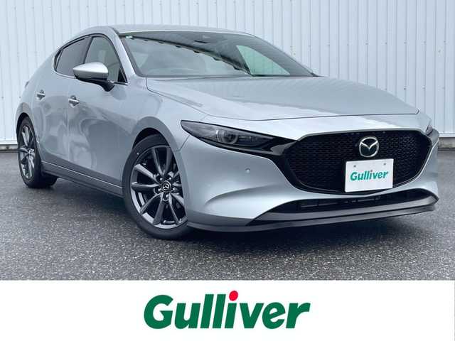 マツダ マツダ３ファストバック 20S プロアクティブ 滋賀県 2022(令4)年 1.8万km ソニックシルバーM 純正メモリナビ/(フルセグTV CD DVD Bluetooth USB)/バックカメラ/レーダークルーズコントロール/ブラインドスポットモニター/プッシュスタート/スマートキー×２/電動格納ミラー/ウインカーミラー/ドライブレコーダー/ETC/LEDオートヘッドライト/ダウンサス