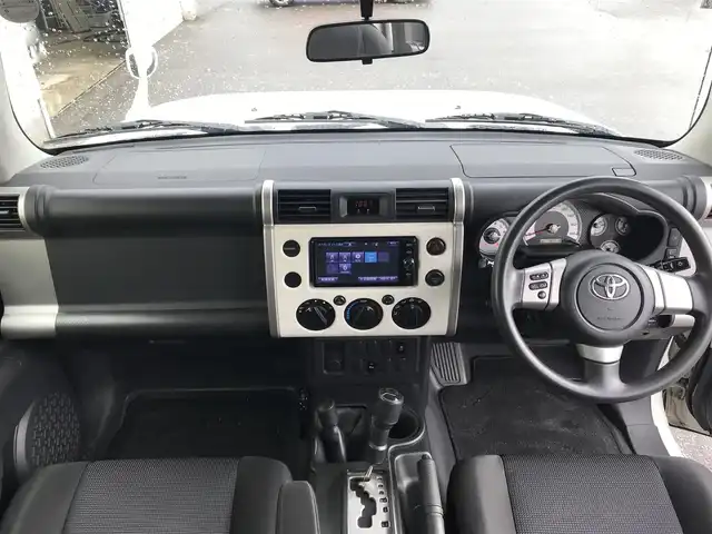 トヨタ ＦＪクルーザー 富山県 2017(平29)年 9.3万km ホワイト 4WD/純正ナビ/フルセグTV/Bluetooth/バックカメラ/コーナーセンサー/横滑り防止装置/リモコンキー/スペアキー１本/ステアリングスイッチ/ヘッドライトレベライザー/ETC