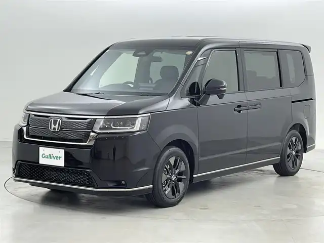 ホンダ ステップワゴン スパーダ 福岡県 2025(令7)年 0.1万km未満 クリスタルブラックパール 登録済未使用車　/純正ナビ　/バックカメラ　/コーナーセンサー　/ＡＣＣ　/衝突軽減ブレーキ　/レーンキープ　/ＢＳＩ　/ＭＴモード付き　/両側電動スライドドア　/ハーフレザー　/シートヒーター　/パワーバックドア　/ＬＥＤ